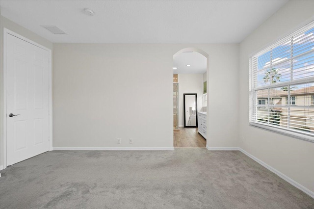 view of carpeted spare room