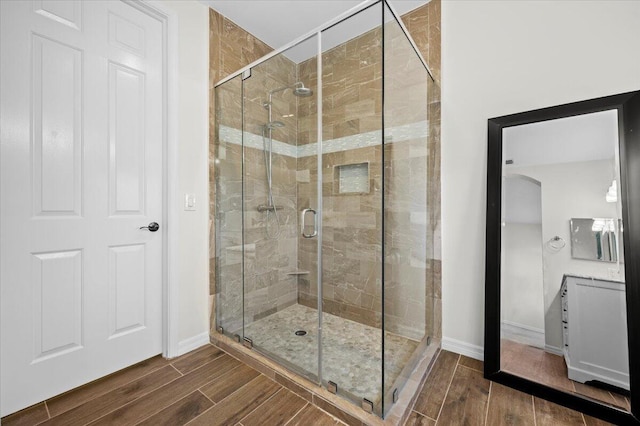 bathroom featuring an enclosed shower