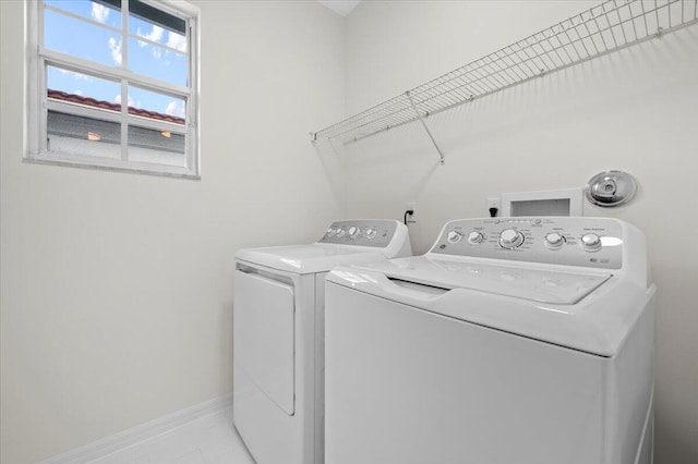 laundry area featuring independent washer and dryer