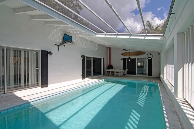 view of pool with a lanai