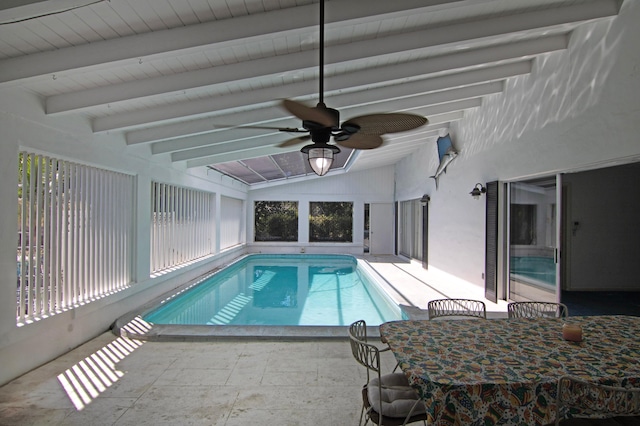 view of swimming pool featuring a patio and ceiling fan