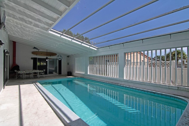 view of pool featuring ceiling fan and a patio area