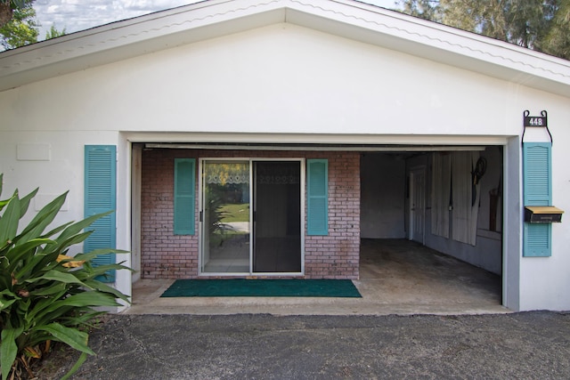 entrance to property with a garage