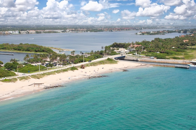 aerial view featuring a water view and a view of the beach