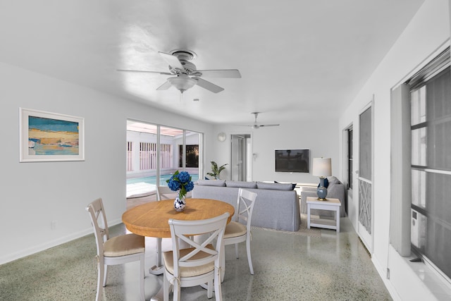 dining space featuring ceiling fan