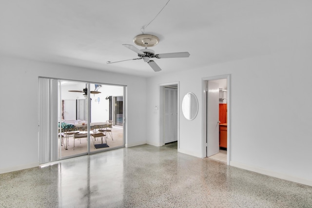 spare room with ceiling fan