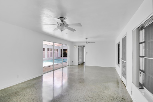 spare room with ceiling fan