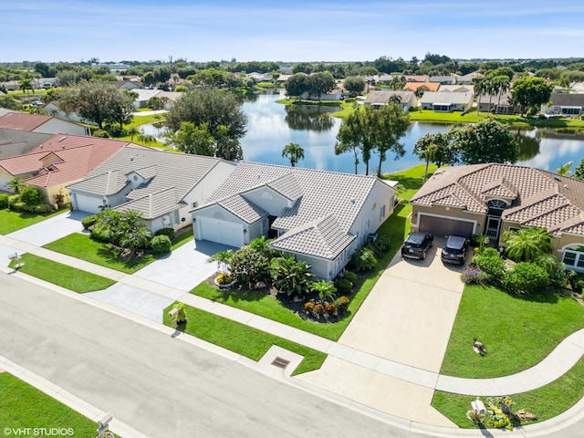 bird's eye view with a water view