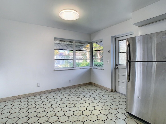 kitchen featuring stainless steel refrigerator