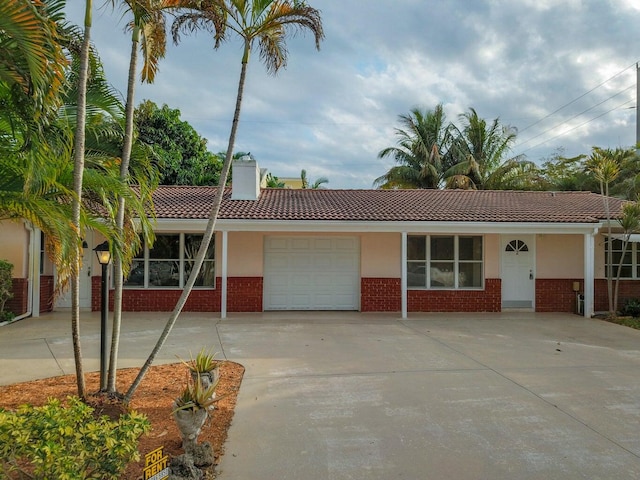 view of front of property with a garage