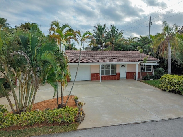 view of front of property with a garage