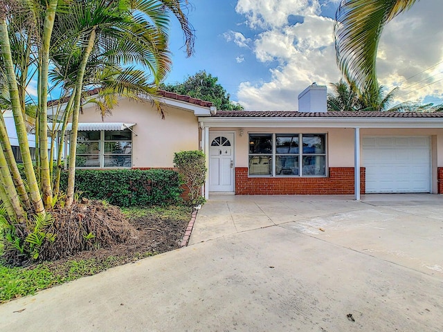 view of front of home with a garage