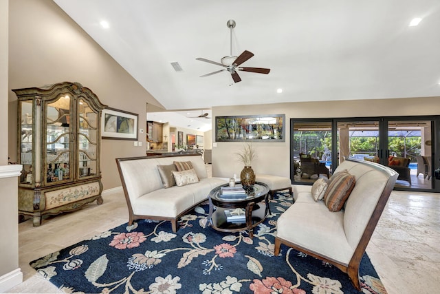 living room featuring ceiling fan and high vaulted ceiling