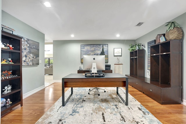 home office featuring light hardwood / wood-style flooring