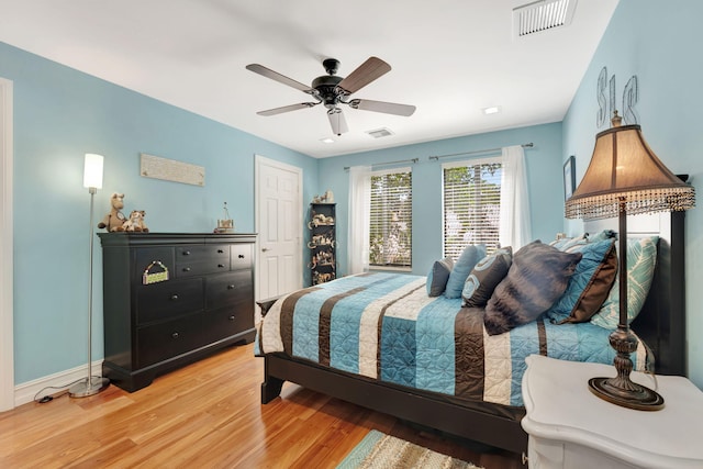 bedroom featuring ceiling fan and hardwood / wood-style floors