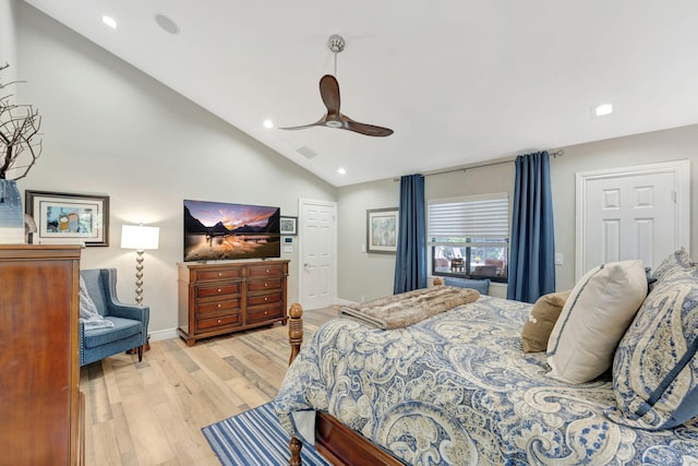 bedroom featuring light hardwood / wood-style floors, ceiling fan, and high vaulted ceiling