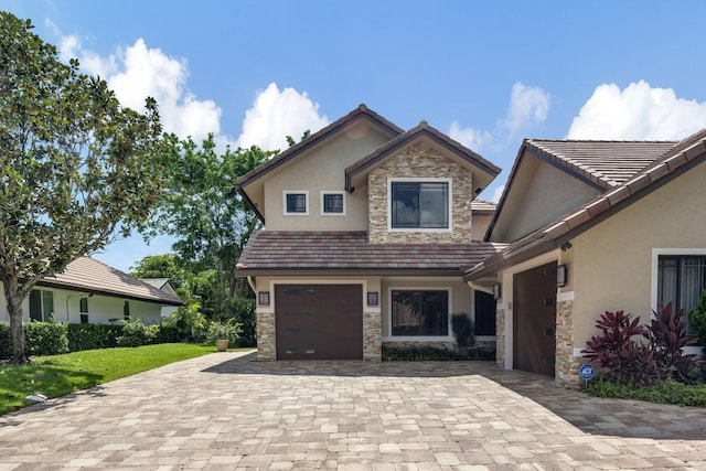 view of front of house with a garage