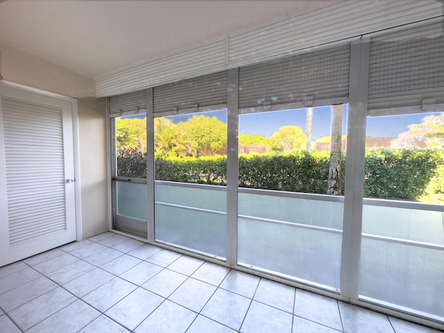 unfurnished sunroom featuring plenty of natural light