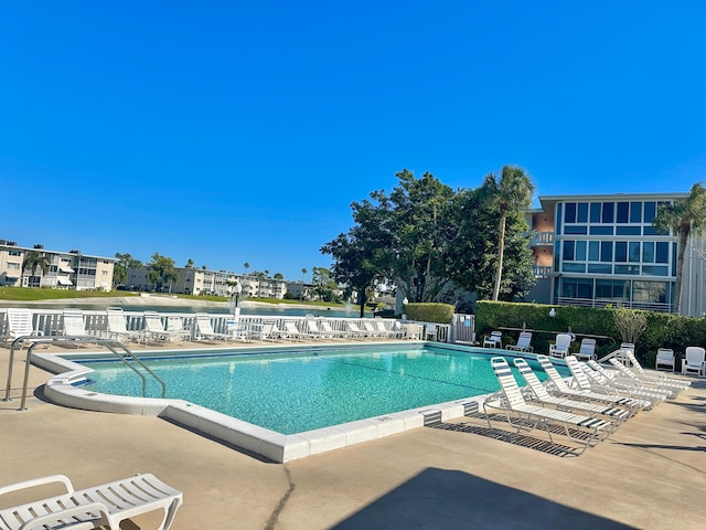 view of swimming pool featuring a patio