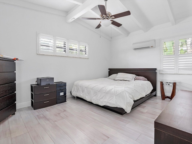 bedroom with lofted ceiling with beams, ceiling fan, a wall mounted AC, and light hardwood / wood-style flooring