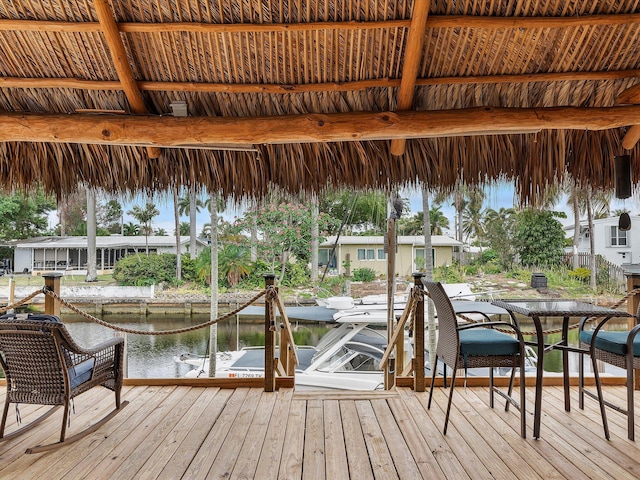 dock area with a water view