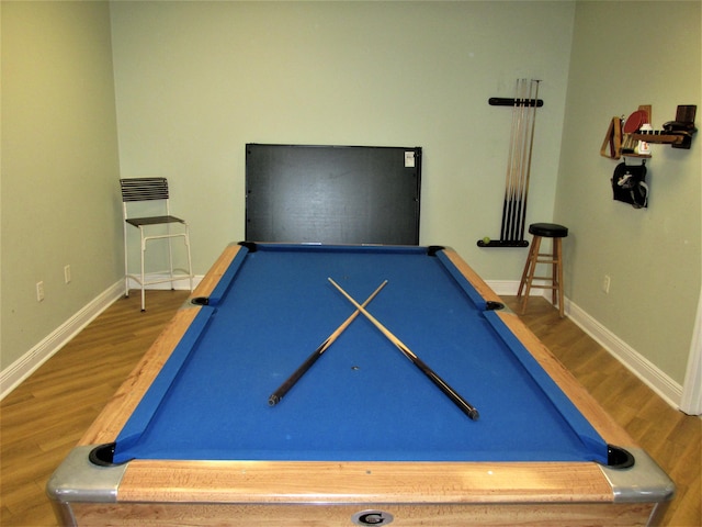 recreation room featuring billiards, wood finished floors, and baseboards