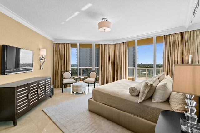 bedroom featuring a wall of windows, ornamental molding, and a textured ceiling