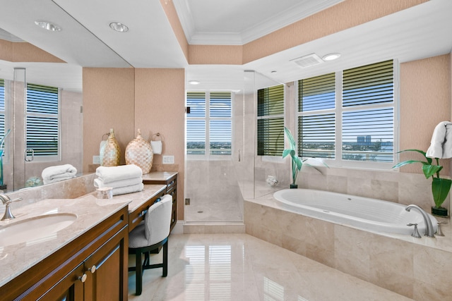 bathroom featuring crown molding, plenty of natural light, vanity, and plus walk in shower