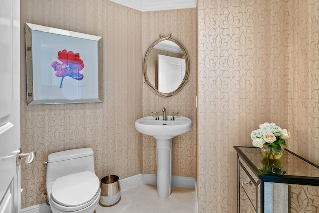 bathroom with tile patterned flooring and toilet