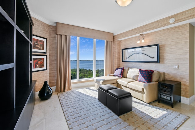 living room with ornamental molding and a water view