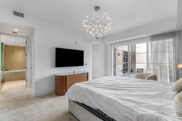 bedroom featuring a notable chandelier, ensuite bathroom, and access to outside