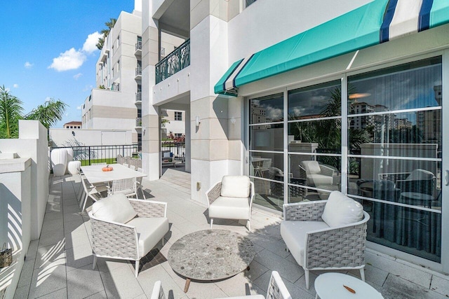 view of patio / terrace featuring a balcony