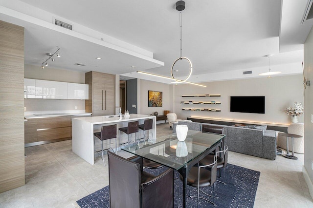 dining space featuring sink