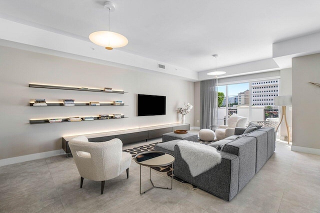 living room featuring light tile patterned floors