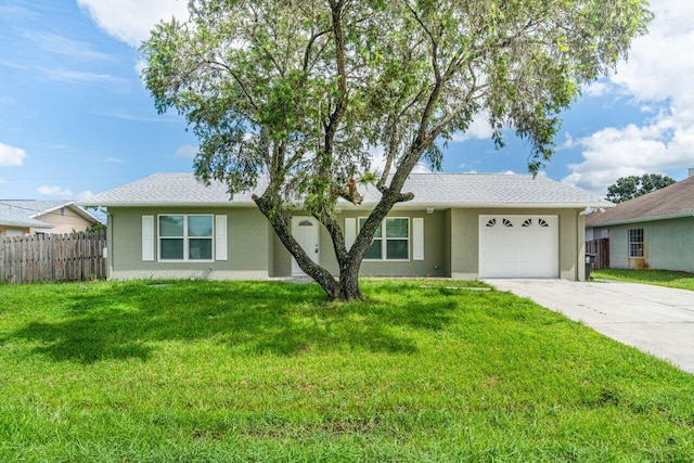 single story home with a front yard and a garage