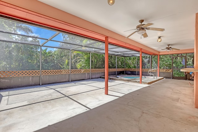 view of patio featuring ceiling fan and a lanai