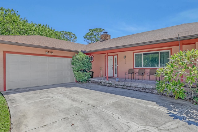 ranch-style house with a garage