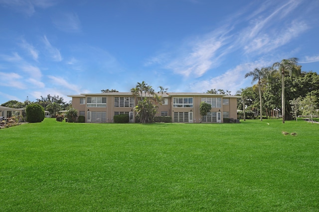 exterior space with a lawn