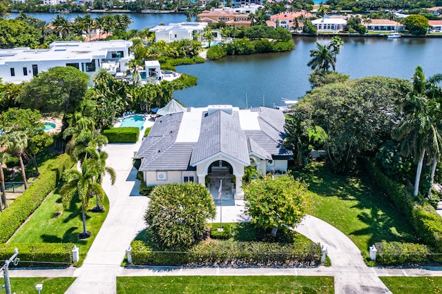 birds eye view of property featuring a water view