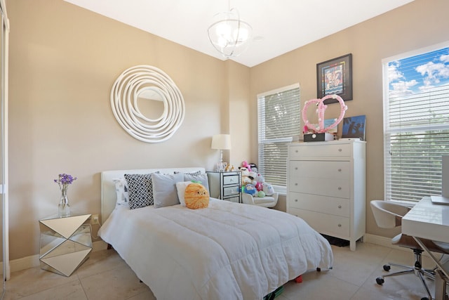 bedroom featuring light tile patterned floors