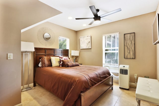 tiled bedroom with ceiling fan