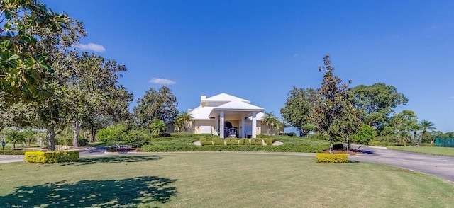 view of front of home with a front lawn