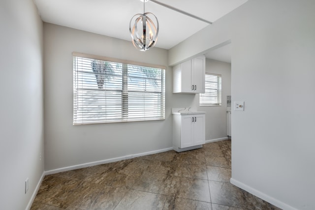 interior space with a chandelier