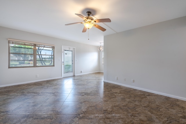 empty room featuring ceiling fan