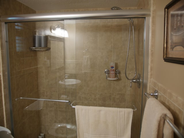 bathroom featuring walk in shower