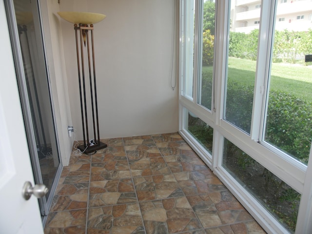 view of unfurnished sunroom