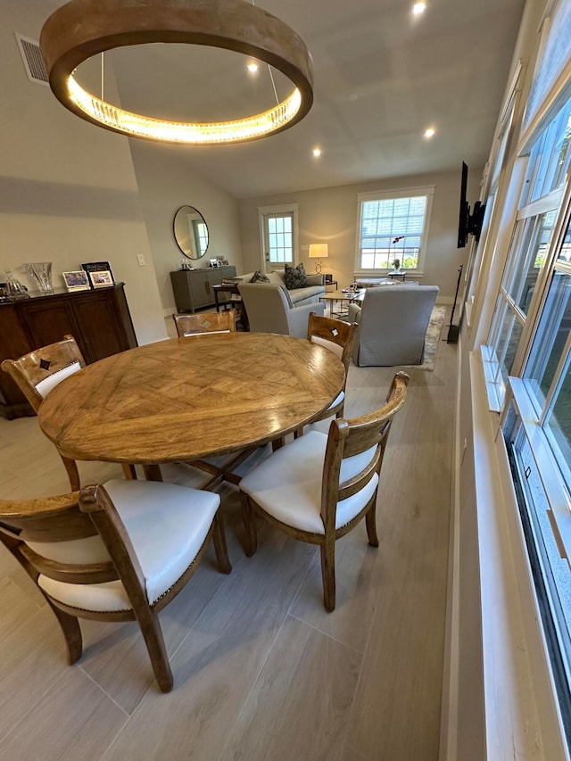 dining area featuring a tray ceiling