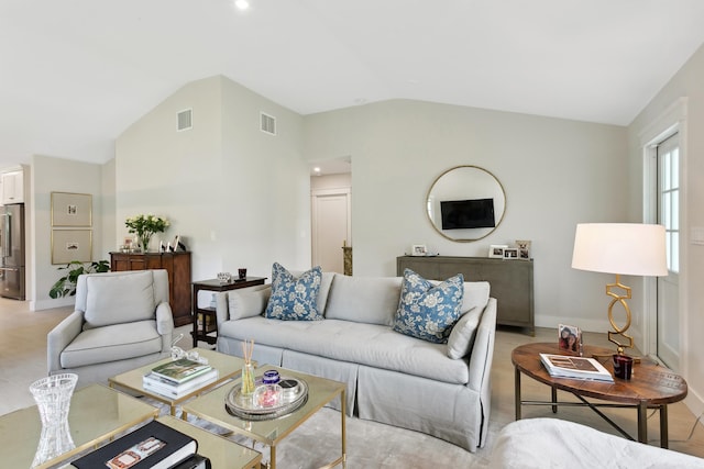 living room with vaulted ceiling