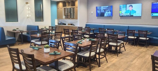 dining space with light hardwood / wood-style flooring