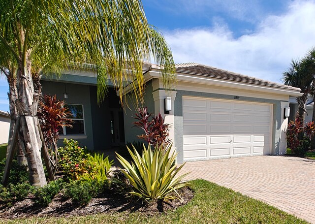 view of front of property with a garage